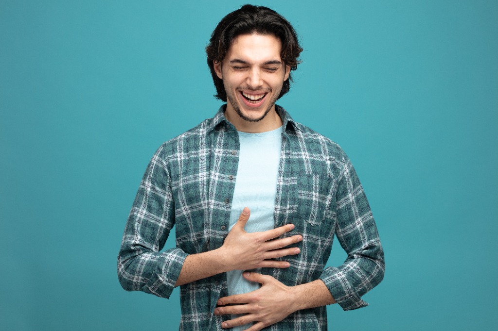 Happy person representing digestive health
